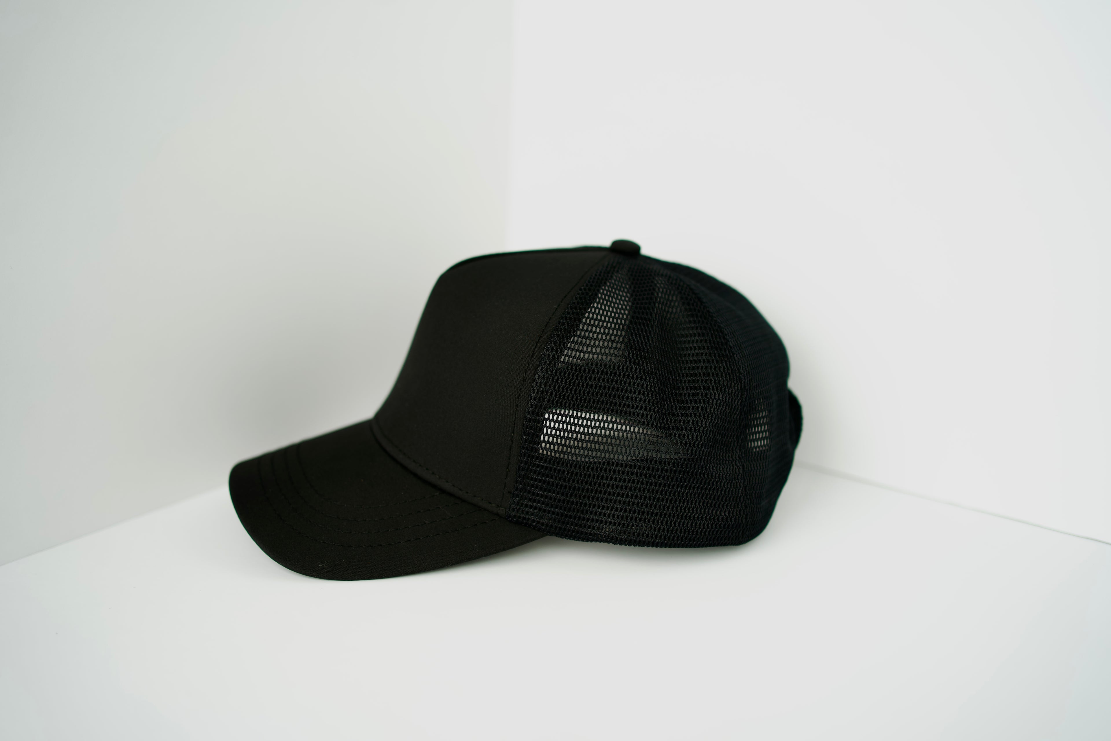 "The Forever Black Trucker Hat"