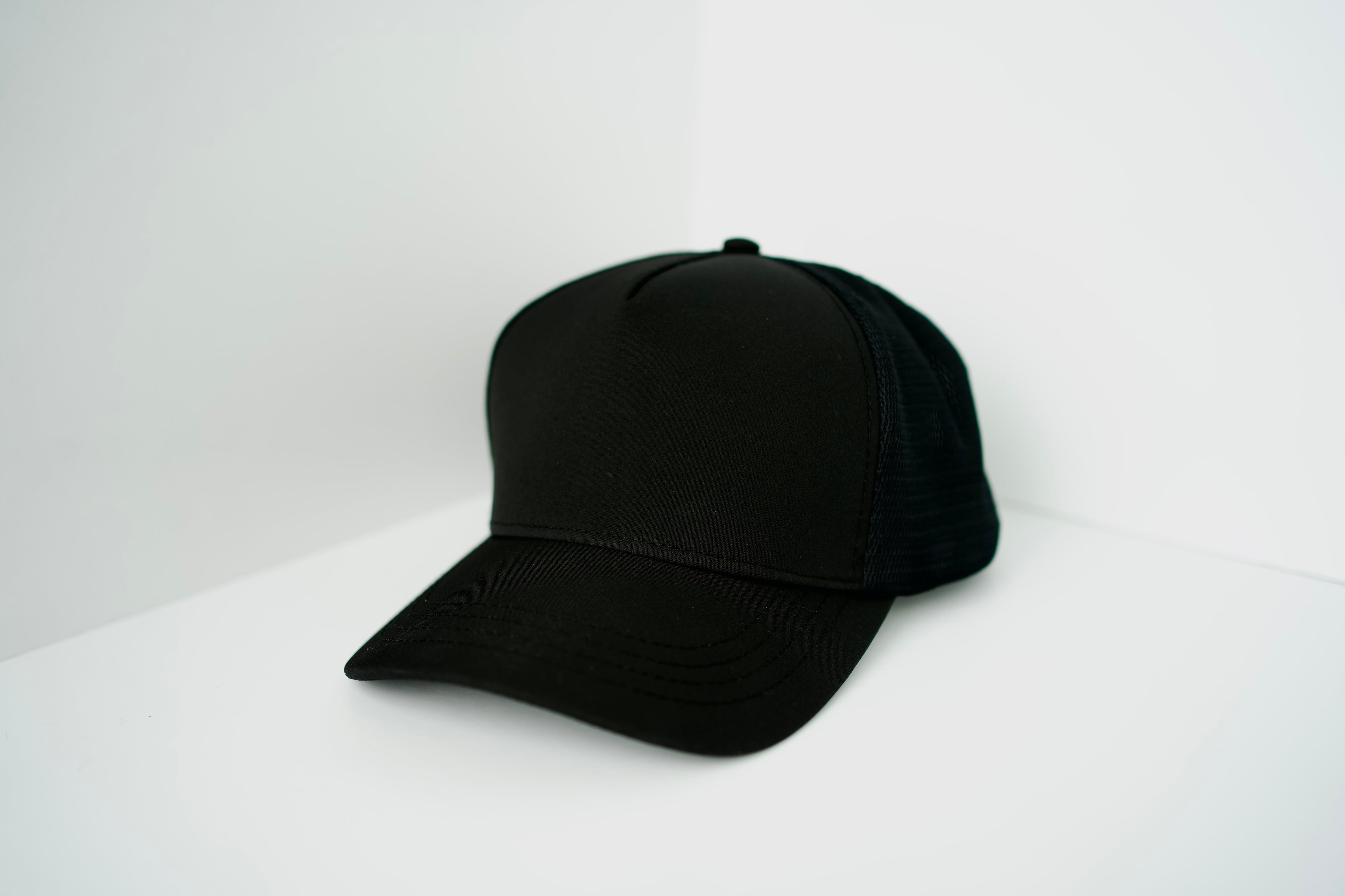 "The Forever Black Trucker Hat"
